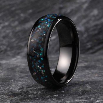 A ceramic ring with ultra-dense meteorite, crafted from lavender opal by Gentlebands.