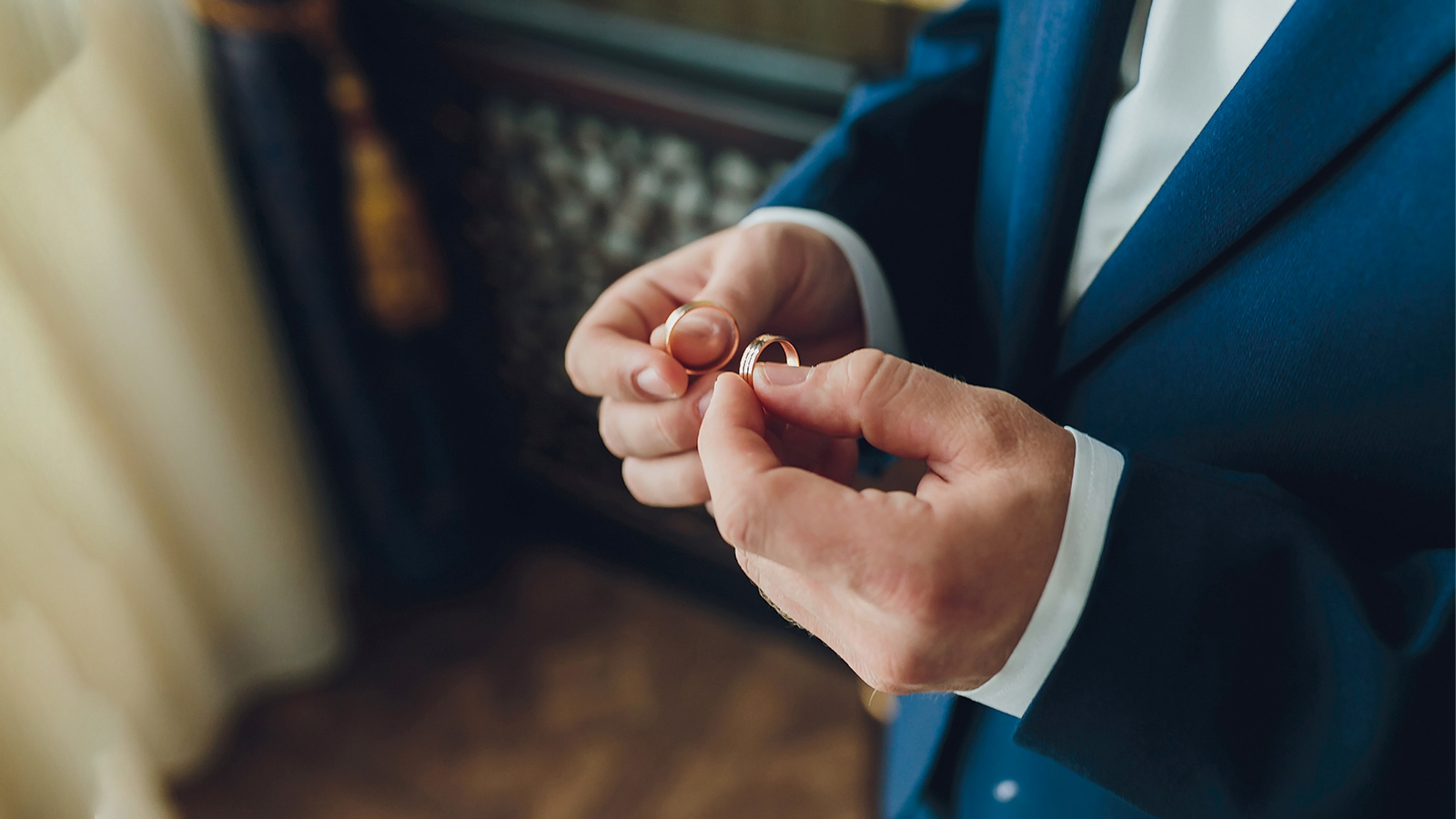 man with wedding ring on