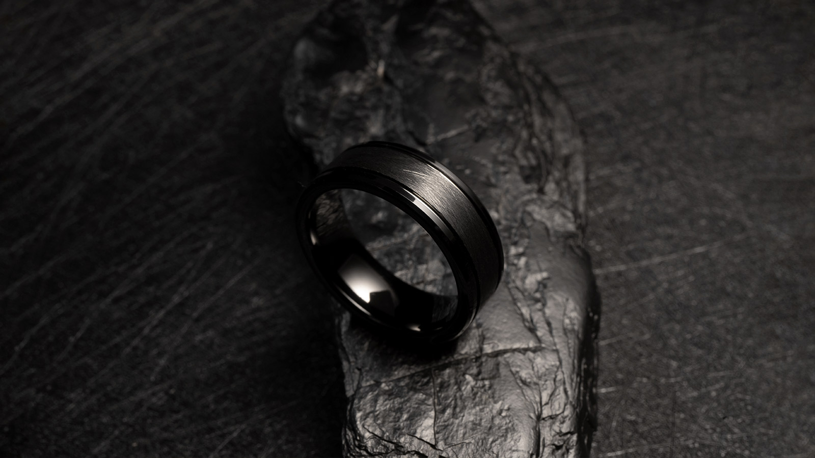 A black classic men's ring, made by Gentlebands, delicate and elegant